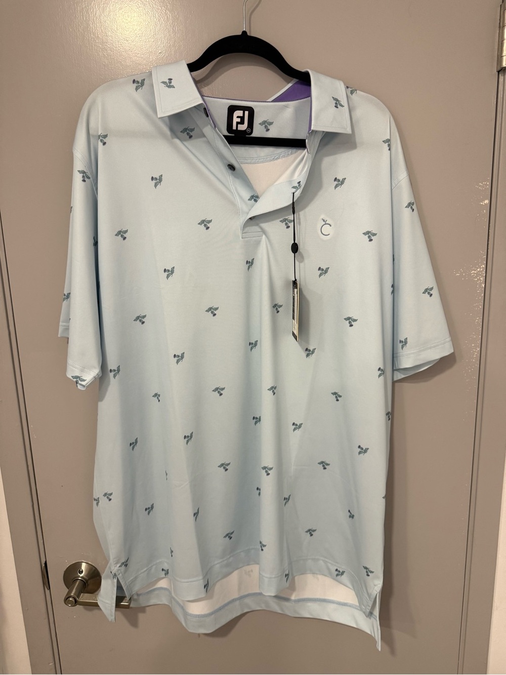 FootJoy Men’s Pale Blue Polo with Subtle Navy Print